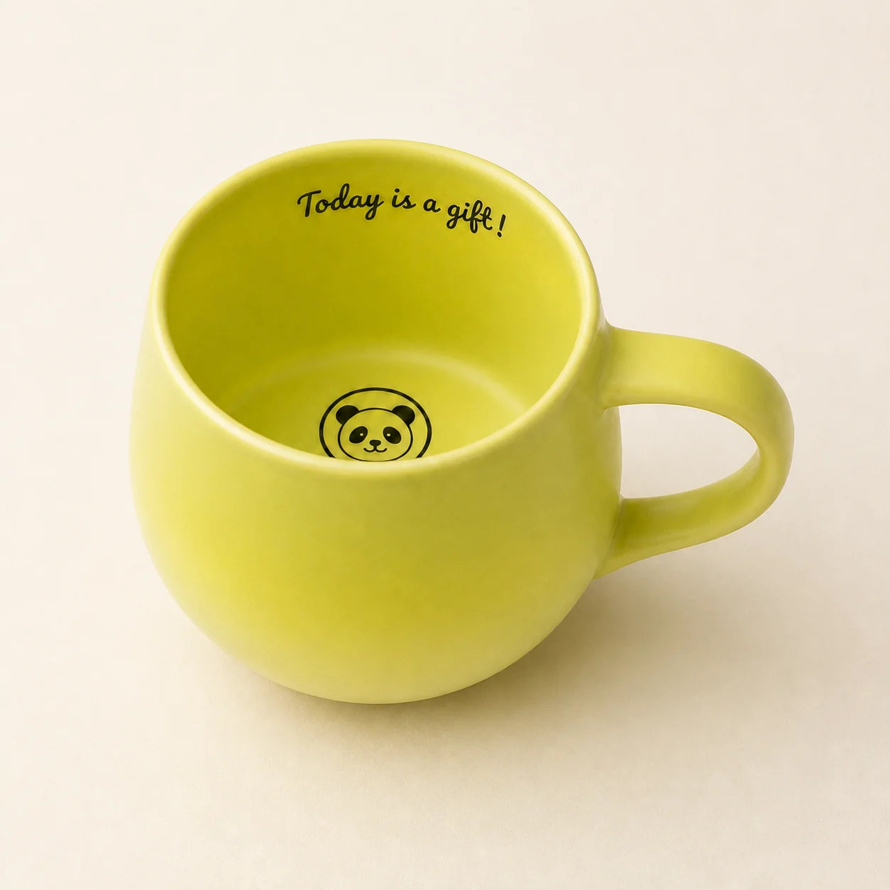 Green Panda mug showing the Today is a gift inner-rim message and hidden panda illustration