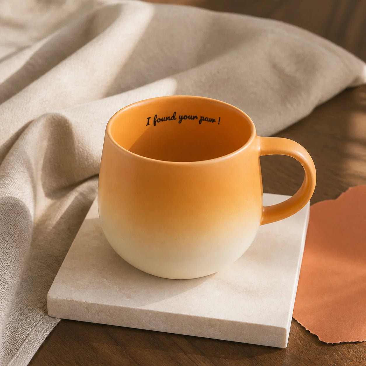 Yellow Dog mug showing the I found your paw inner-rim message